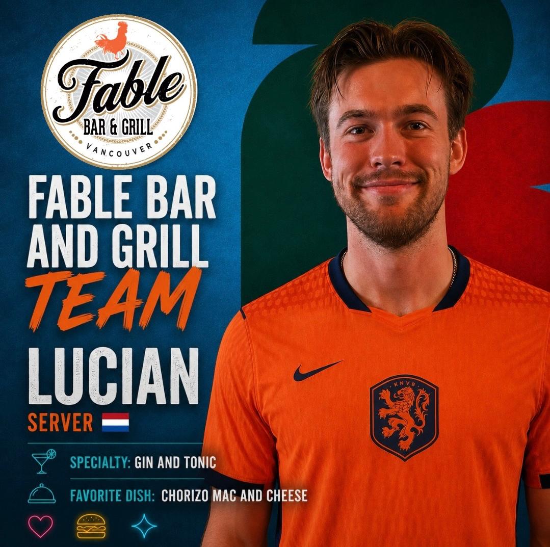Lucian, server at Fable Bar and Grill, wearing a Netherlands jersey